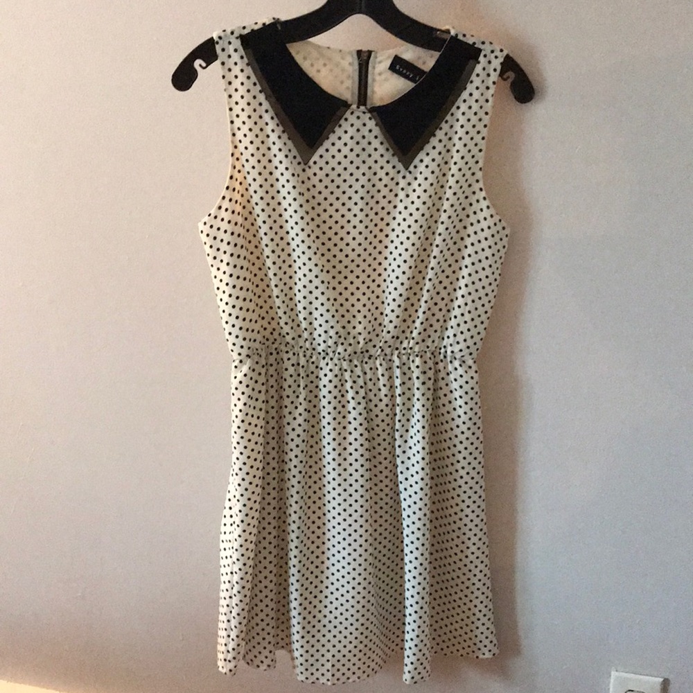 White dress with black collar